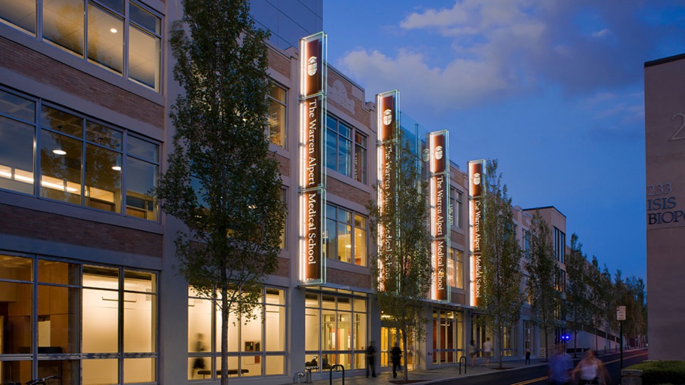 Medical school exterior at dusk